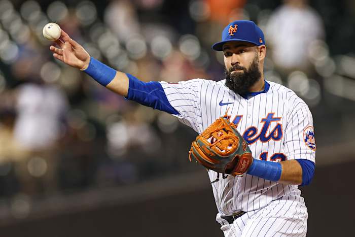 Sep 27, 2023; New York City, New York, USA; New York Mets second baseman Luis Guillorme (13) throws the ball to first base for an out during the ninth inning against the Miami Marlins at Citi Field.